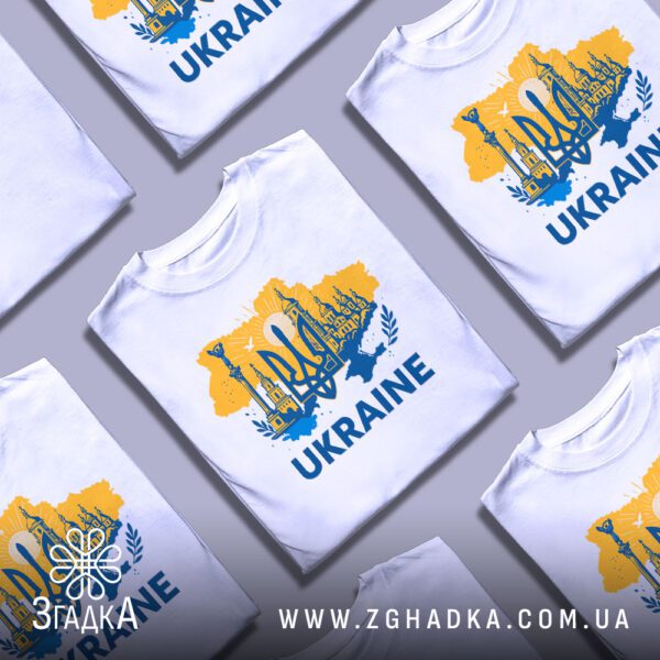 Креативна презентація складених білих футболок Патріотична Україна Подарунок з повторюваним принтом.