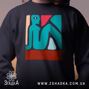 Крупний план принту "абстрактний малюнок" на чорному світшоті, що детально показує ілюстрацію.