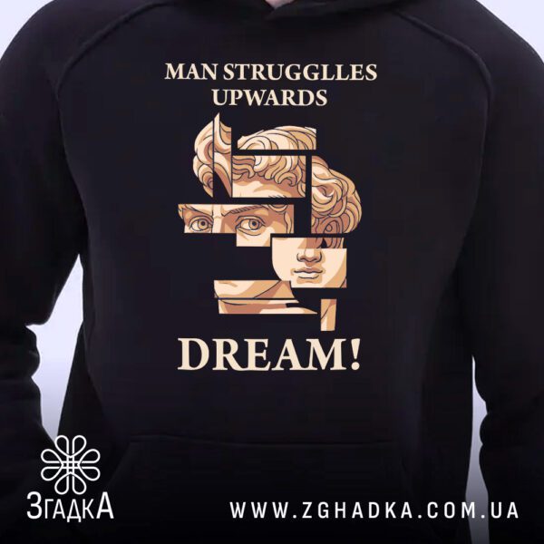 Чорне худі з принтом "DREAM!" та фрагментом бюста на манекені.