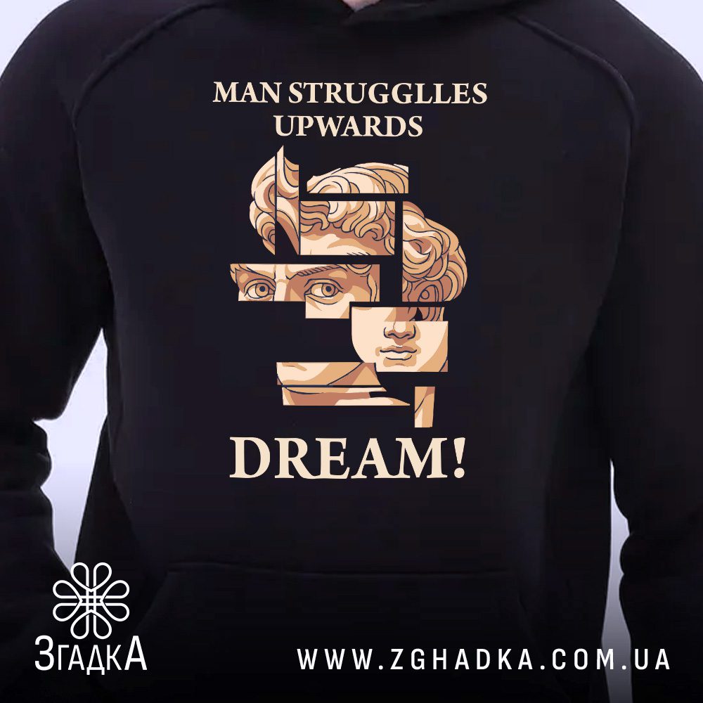 Чорне худі з принтом "DREAM!" та фрагментом бюста на манекені.