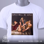 Футболка гострий фемсил білого кольору, складена на поверхні, фон світло-сірий, принт з написом 'GIRLS WILL BE GIRLS' на картині, з зеленим ярликом, що звисає.