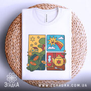 Футболка теплий ранок. Біла футболка, складена на плетеному кошику, принт яскравий, з елементами природи, сонце, зірки та чайник, фон нейтральний.