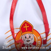 Мішечок для цукерок від Миколая крупний план тканини та деталей друку.