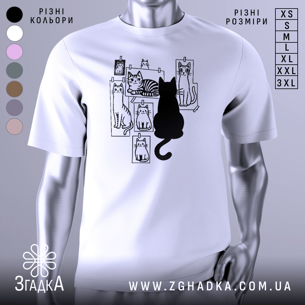 Футболка котячий світ, біла, зображена на манекені, фон світло-сірий, принт з чорними котами на фотографіях, один чорний кіт сидить спиною до глядача.