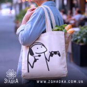 Шопер геймерський персонаж подарунок — деталі тканини, ручок і швів крупним планом.