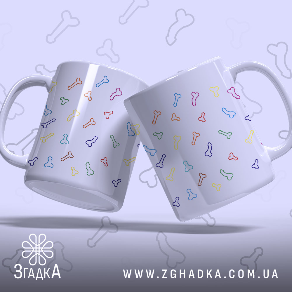 Чашка з кольоровими піструнами, дві однакові чашки з малюнками кісточок, зображені під кутом, фон світло-фіолетовий, ручки стандартні, краї рівні, глянцева поверхня.