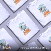 Футболка корова La Vaca Saturna, складена, біла, кілька футболок з принтом корови.